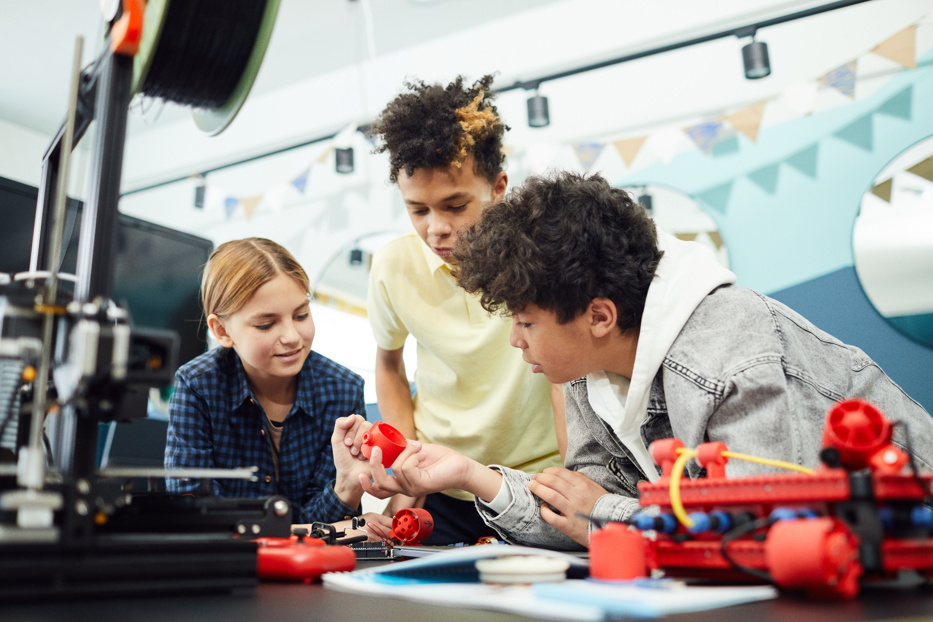 Kids taking part in a hands-on youth making activity